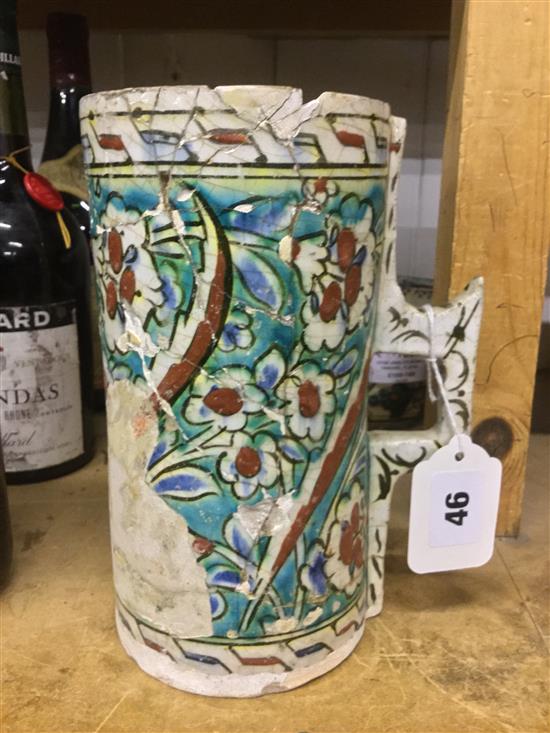 17/18C Iznik cylindrical tankard, floral painted with strap handle and similar bowl (repairs and very A/F)